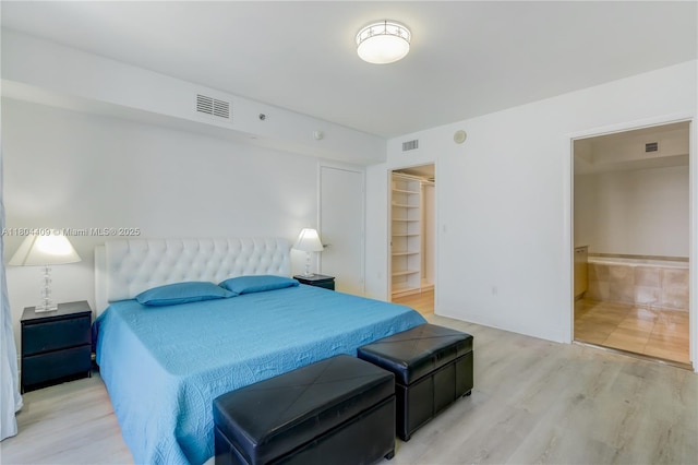 1830 S Ocean Dr Unit 3804, Hallandale Beach, FL 33009 - bedroom with wood finished floors, a spacious closet, and ensuite bathroom