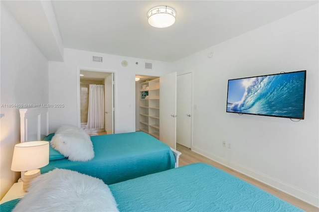 1830 S Ocean Dr Unit 3804, Hallandale Beach, FL 33009 - bedroom with light wood finished floors, baseboards, a closet, and a spacious closet