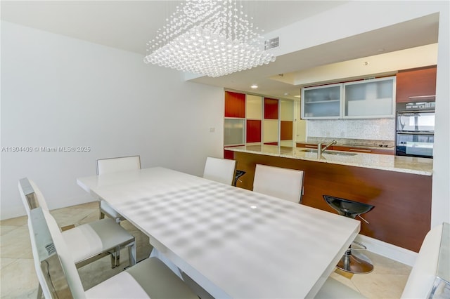 1830 S Ocean Dr Unit 3804, Hallandale Beach, FL 33009 - dining room with light tile patterned floors and baseboards