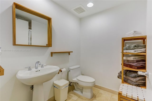 1830 S Ocean Dr Unit 3804, Hallandale Beach, FL 33009 - bathroom with toilet, baseboards, and tile patterned floors