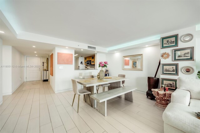 2101 Brickell Ave Unit 807, Miami, FL 33129 - dining room with recessed lighting and baseboards