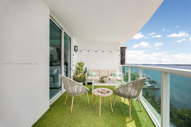 2101 Brickell Ave Unit 807, Miami, FL 33129 - balcony featuring outdoor lounge area