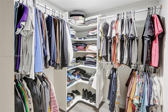 1033 NW 124th Ave, Pembroke Pines, FL 33026 - spacious closet featuring wood finished floors