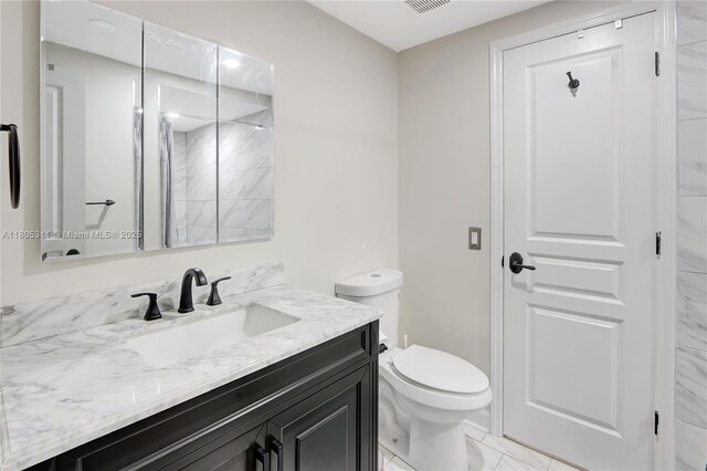 1033 NW 124th Ave, Pembroke Pines, FL 33026 - bathroom with vanity, marble finish floors, and toilet