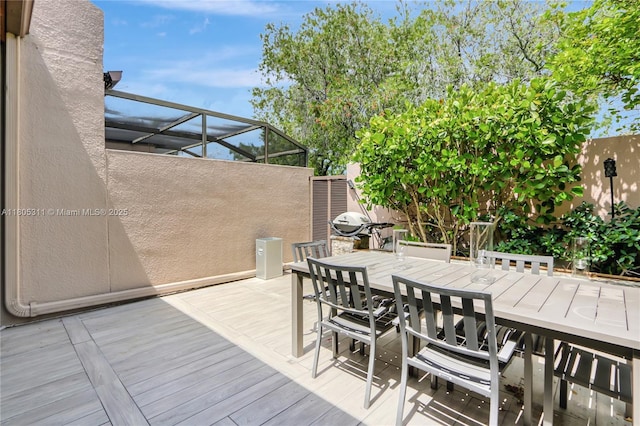 1033 NW 124th Ave, Pembroke Pines, FL 33026 - wooden terrace with outdoor dining area