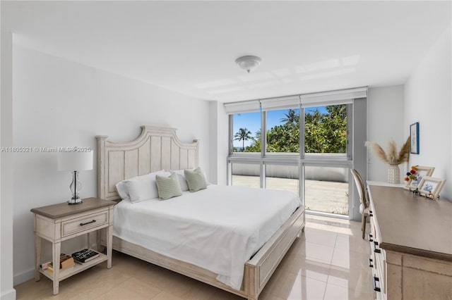 2655 Collins Ave Unit 411, Miami Beach, FL 33140 - bedroom featuring light tile patterned flooring