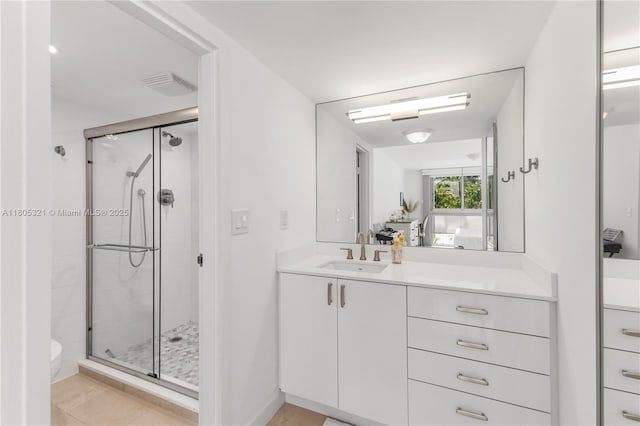 2655 Collins Ave Unit 411, Miami Beach, FL 33140 - full bathroom with a shower stall, vanity, and toilet