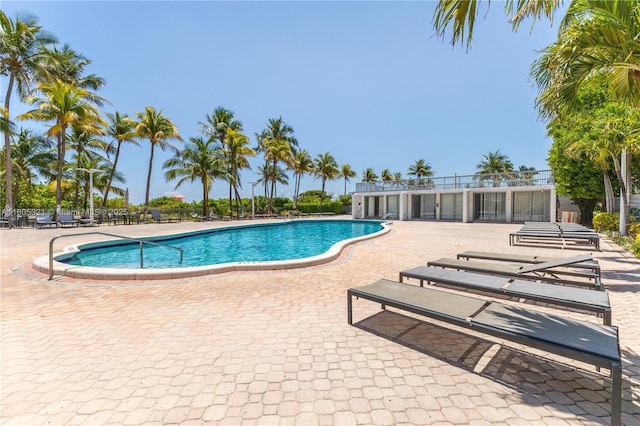2655 Collins Ave Unit 411, Miami Beach, FL 33140 - community pool featuring a patio
