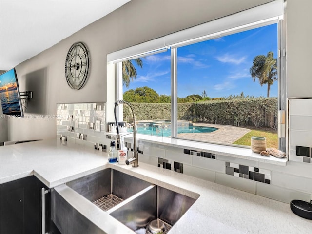 15066 SW 38th Ter, Miami, FL 33185 - kitchen with a sink and light countertops