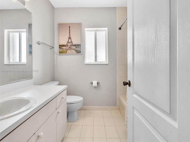 15066 SW 38th Ter, Miami, FL 33185 - bathroom featuring vanity, tile patterned floors, toilet, shower / washtub combination, and baseboards