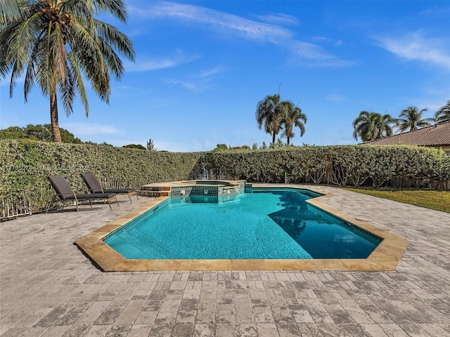 15066 SW 38th Ter, Miami, FL 33185 - view of pool with a patio area and a pool with connected hot tub