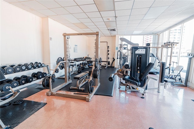 1817 S Ocean Dr Unit 0918, Hallandale Beach, FL 33009 - workout area featuring expansive windows, tile patterned floors, and a drop ceiling