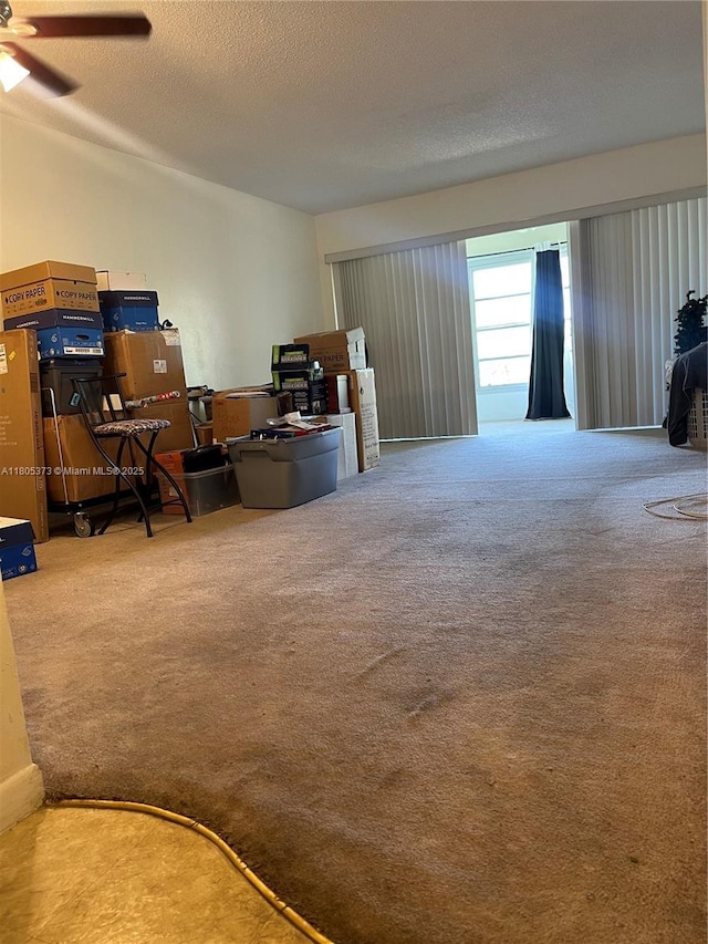 6071 NW 61st Ave Unit 311, Tamarac, FL 33319 - office with carpet, a textured ceiling, and a ceiling fan