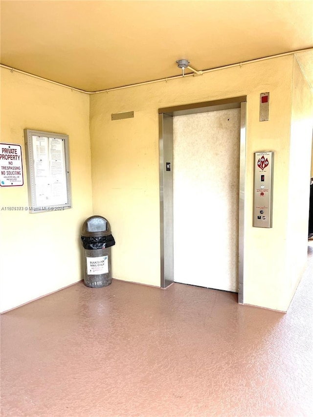 6071 NW 61st Ave Unit 311, Tamarac, FL 33319 - unfurnished room with elevator