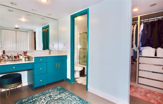 20379 W Country Club Dr Unit 836, Aventura, FL 33180 - bathroom with an enclosed shower, vanity, toilet, a spacious closet, and recessed lighting
