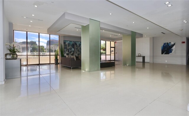 20379 W Country Club Dr Unit 836, Aventura, FL 33180 - common area with floor to ceiling windows and recessed lighting