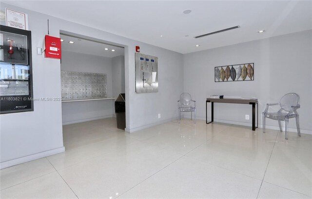 20379 W Country Club Dr Unit 836, Aventura, FL 33180 - tiled spare room featuring mail area, recessed lighting, and baseboards