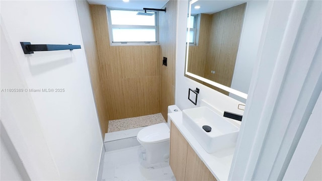 701 Collins Ave Unit 1F, Miami Beach, FL 33139 - bathroom featuring a shower stall, vanity, and marble finish flooring