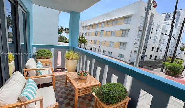 701 Collins Ave Unit 1F, Miami Beach, FL 33139 - balcony featuring an outdoor hangout area