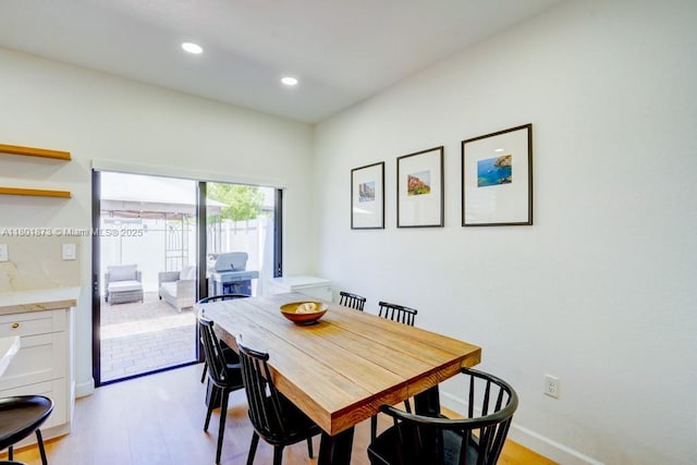 10602 W 33rd Way, Hialeah, FL 33018 - dining area featuring light wood-style floors, recessed lighting, and baseboards