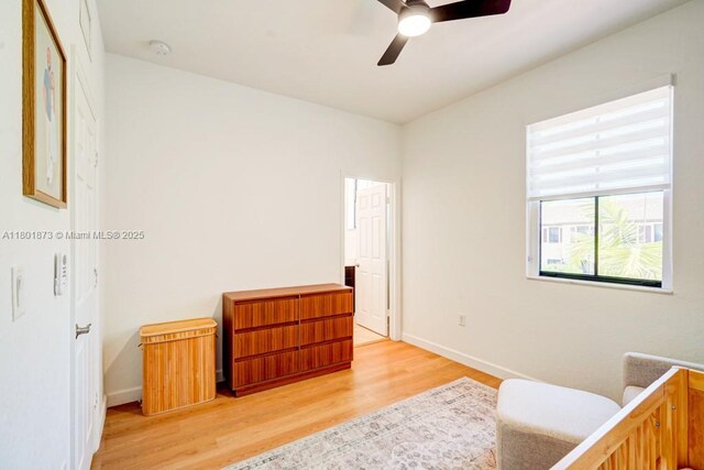 10602 W 33rd Way, Hialeah, FL 33018 - bedroom featuring light wood-type flooring, baseboards, and a ceiling fan