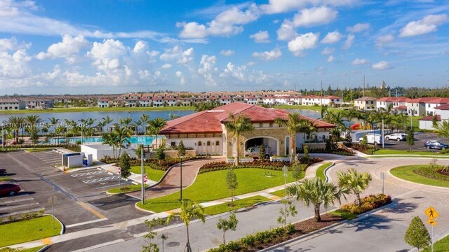 10602 W 33rd Way, Hialeah, FL 33018 - aerial view of residential area with a large body of water and a pool