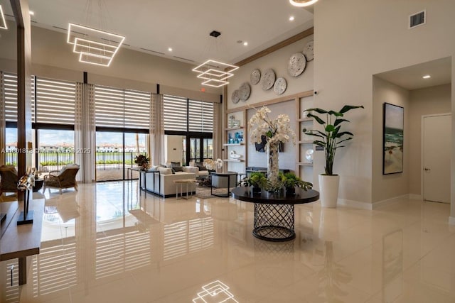 10602 W 33rd Way, Hialeah, FL 33018 - lobby featuring a high ceiling and recessed lighting