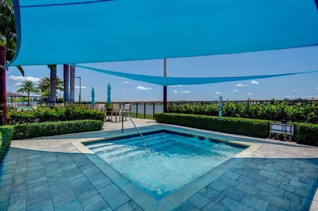 10602 W 33rd Way, Hialeah, FL 33018 - view of swimming pool featuring a patio area
