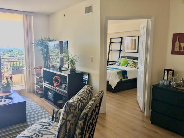3232 SW 22nd Ter Unit 1303, Miami, FL 33145 - living room featuring wood finished floors