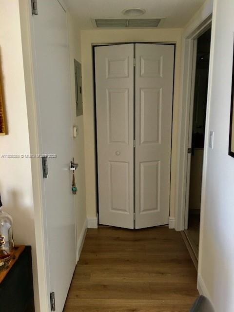 3232 SW 22nd Ter Unit 1303, Miami, FL 33145 - corridor with electric panel, light wood-style floors, and baseboards