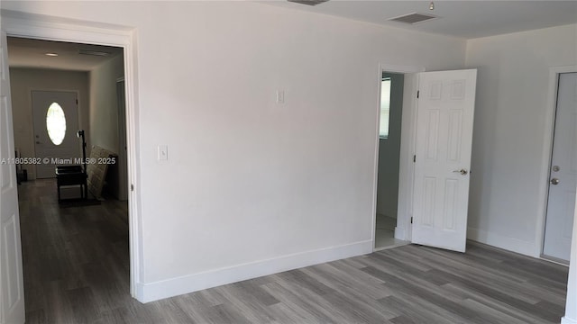 3601 N 72nd Ave, Hollywood, FL 33024 - unfurnished room featuring wood finished floors and baseboards
