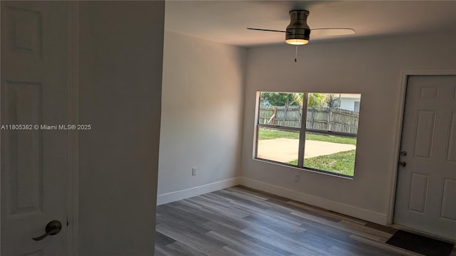 3601 N 72nd Ave, Hollywood, FL 33024 - unfurnished room featuring a ceiling fan, wood finished floors, and baseboards