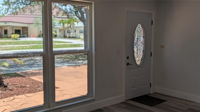 3601 N 72nd Ave, Hollywood, FL 33024 - entryway with dark wood-style floors and baseboards