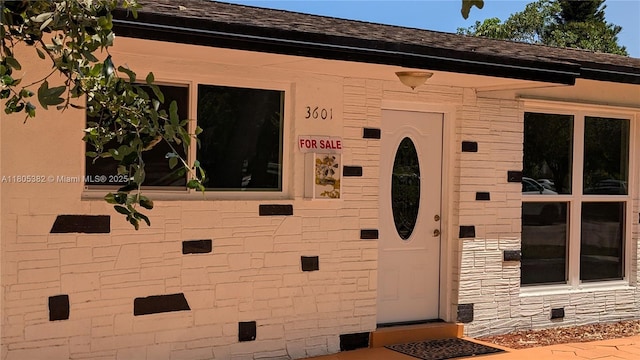 3601 N 72nd Ave, Hollywood, FL 33024 - property entrance with stone siding