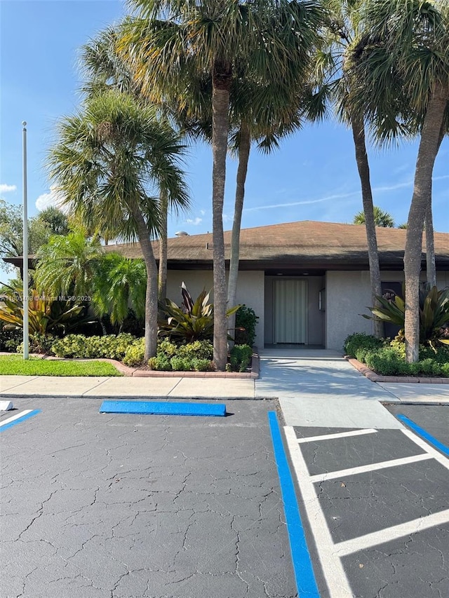 9481 W Elm Ln, Miramar, FL 33025 - view of property with uncovered parking