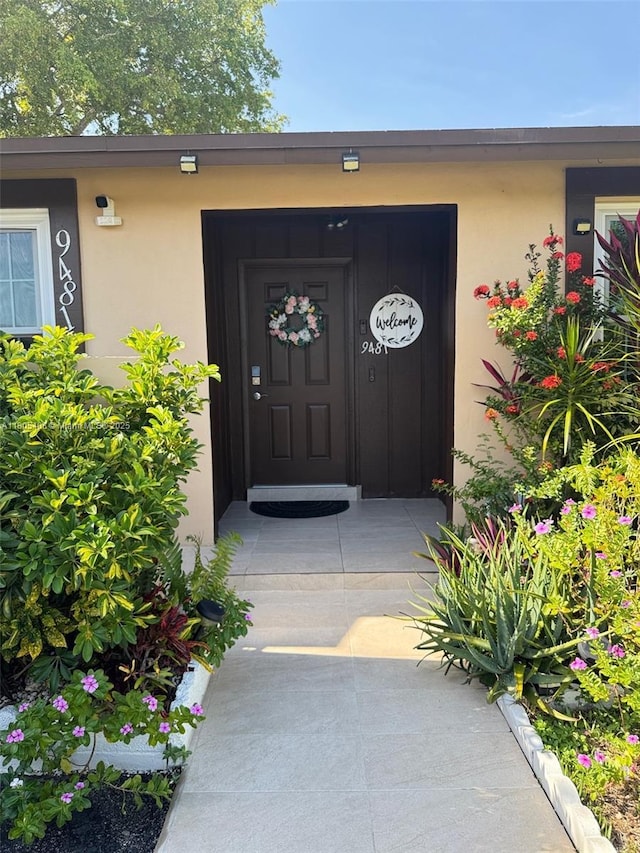 9481 W Elm Ln, Miramar, FL 33025 - property entrance with stucco siding