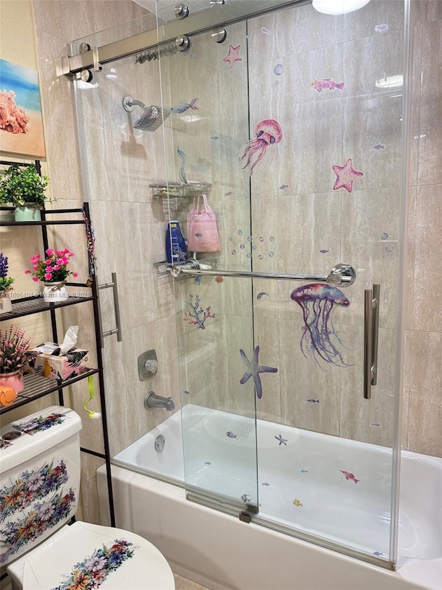 9481 W Elm Ln, Miramar, FL 33025 - bathroom featuring shower / bath combination with glass door and toilet