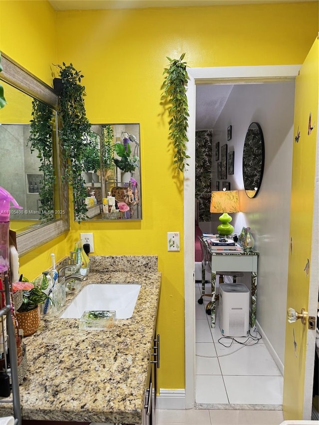 9481 W Elm Ln, Miramar, FL 33025 - bathroom with vanity, tile patterned flooring, and baseboards