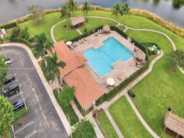 2207 SE 23rd Ave Unit 2207, Homestead, FL 33035 - drone / aerial view of a pool and a large body of water