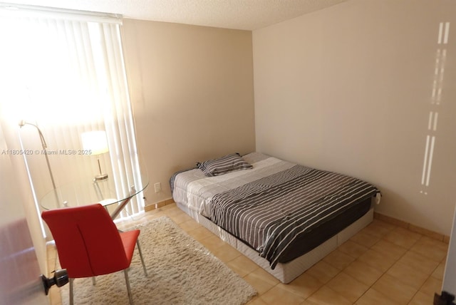 17011 N Bay Rd Unit 408, Sunny Isles Beach, FL 33160 - bedroom featuring light tile patterned flooring and baseboards