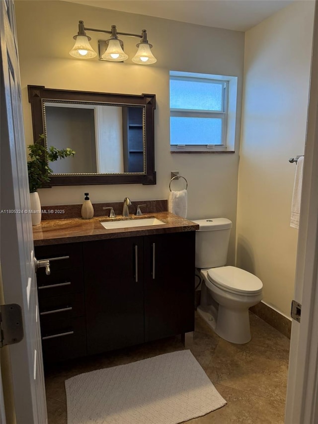 218 NE 12th Ave Unit 503, Hallandale Beach, FL 33009 - bathroom featuring vanity, toilet, and baseboards