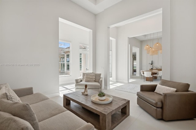 5630 N Sterling Ranch Dr, Davie, FL 33314 - living area with a chandelier and light tile patterned flooring