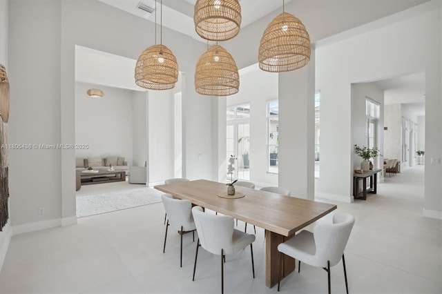 5630 N Sterling Ranch Dr, Davie, FL 33314 - dining area featuring baseboards