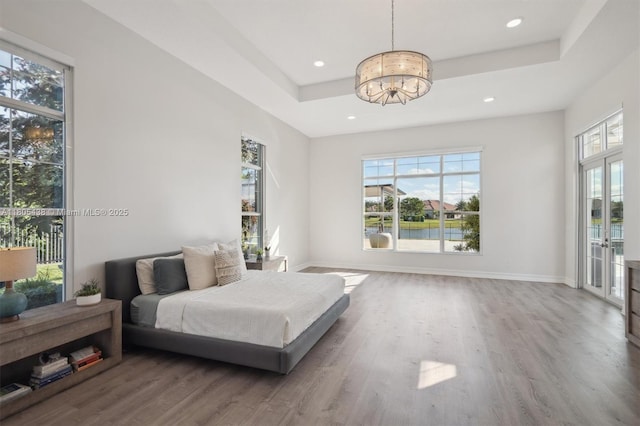 5630 N Sterling Ranch Dr, Davie, FL 33314 - bedroom with a chandelier, multiple windows, wood finished floors, and recessed lighting