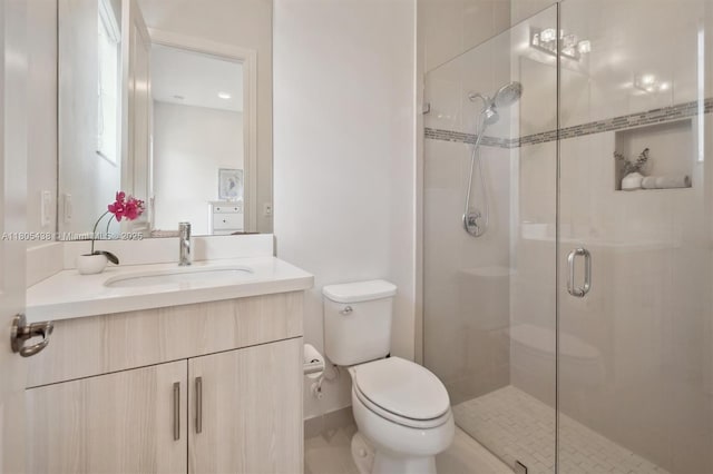 5630 N Sterling Ranch Dr, Davie, FL 33314 - full bathroom with a stall shower, toilet, vanity, and baseboards