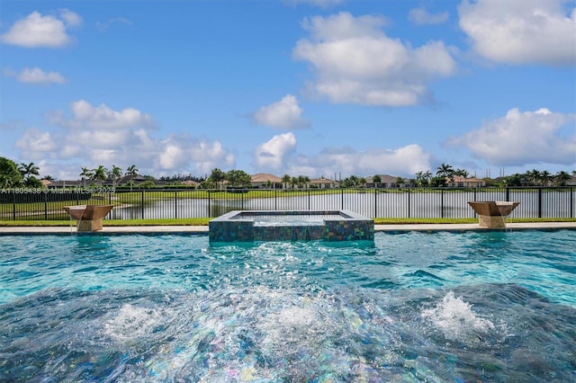 5630 N Sterling Ranch Dr, Davie, FL 33314 - view of pool featuring fence and a pool with connected hot tub