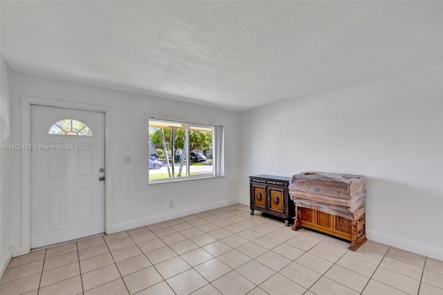 5220-5224 NW 15th Ct, Lauderhill, FL 33313 - foyer entrance with baseboards and light tile patterned flooring