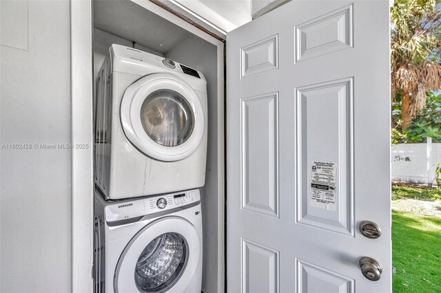 5220-5224 NW 15th Ct, Lauderhill, FL 33313 - laundry area featuring stacked washer and clothes dryer