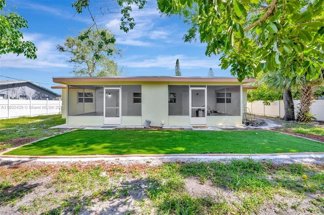5220-5224 NW 15th Ct, Lauderhill, FL 33313 - back of house featuring a sunroom
