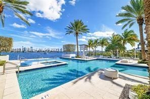 17301 Biscayne Blvd Unit 603, North Miami Beach, FL 33160 - community pool featuring a hot tub and a patio area